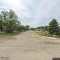Broken railroad crossing near Third Street