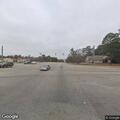 Traffic stop on burgundy Kia Optima