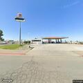 Fall victim receives medical aid at gas station