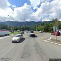 Disabled car blocking roundabout lane in North Bend