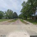 Unoccupied car parked facing wrong way on Hess Street