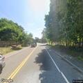 Erratic driver in red minivan on North Main Street