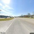 Man running in and out of road, blocking traffic