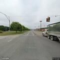 Erratic driver in silver SUV on wrong side of road