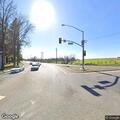 Man lying unconscious in roadway at intersection