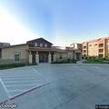 Person needing medical aid at apartment parking lot