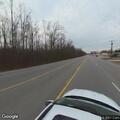 Traffic stop involving blue minivan and white sedan