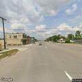 Male lying on sidewalk at 9th St and Southfield Rd