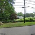Tree and wires blocking Plain Hill Road in Norwich