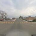Open hydrant causing traffic hazard at intersection