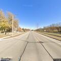 Officer checks person walking near Highway 133