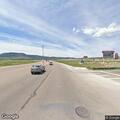 Traffic stop on red Jeep Cherokee in Monument