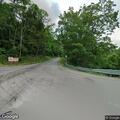 Tree on cable lines blocks River Road in Worthville