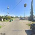 Driver refusing to leave driveway on Miller Avenue