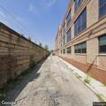 Person down near Kinzie Canal and river bank in Chicago