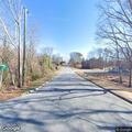 Caller reports friend may be held on Romaine Street
