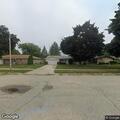 Traffic stop on black Dodge Caravan