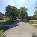 Smoldering park bench fire in North Chicago
