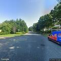 Person hitting head and walking on Talmadge Trail