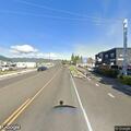 People with bike running across freeway lanes
