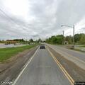 Parked car blocking roadway near bridge on OH-528