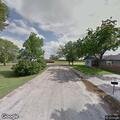 Delivery truck hits house gutter on South Marshall