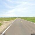 Broken farm equipment blocks traffic on Highway 103