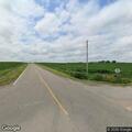 Semi truck slides into ditch at rural intersection