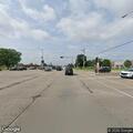 Stalled SUV on interstate left shoulder