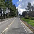 Van tipped over in field near South Toutle Road