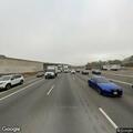 Vehicle in center divide after westbound collision