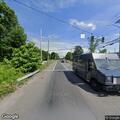 Two-car crash with fluid spill in Trumbull