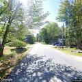 School bus stopped in middle of Stoneham Road