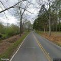 Tree blocking traffic lane on Cave Spring Road