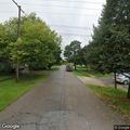 Small bonfire after gas can explodes in yard