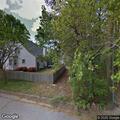 Woman wandering yard and taking items reported