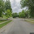 Officer searching for fleeing suspect on foot