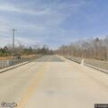 Broken railroad crossing arm on Oakdale Lane