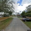 Traffic stop on silver Nissan Versa