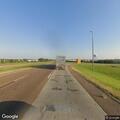 White car stopped on exit ramp; possible medical issue