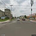 Road closure sign blocks turns on Main Street
