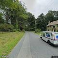 Loose flagpole near cemetery reported