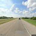 Driver hits and knocks down exit ramp sign