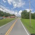 Disturbance with man throwing objects on Coal City Road