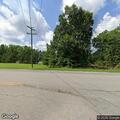 man shaking while lying in road at brook and shade st