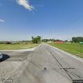 Semi backs into car at West Division Road stop sign