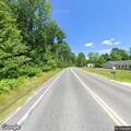 Truck with trailer blocking both lanes of roadway