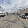 Woman in distress in car with broken windshield
