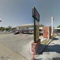 Person yelling for help inside van at gas station
