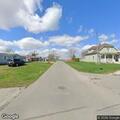 Neighbor accused of threatening elderly man